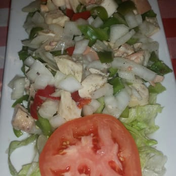 Parada Maimon - Octopus salad with lettuce, tomato, green peppers and onions - Dominican Near Me - Philadelphia, Pennsylvania
