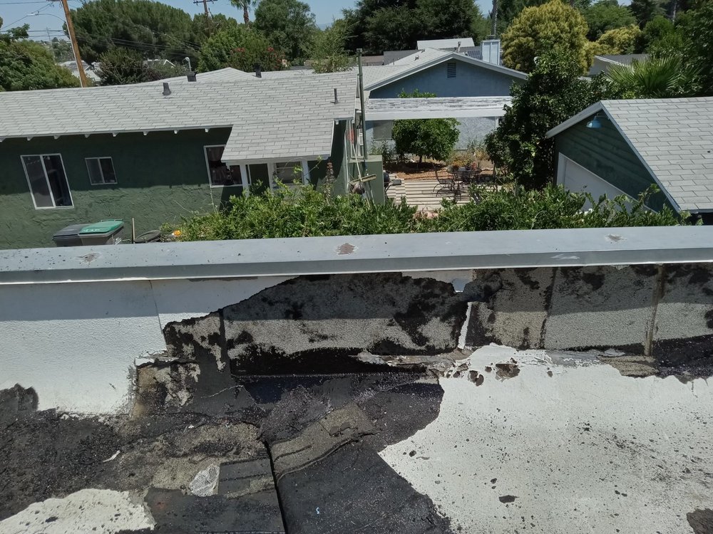 Slide of Ronald's Roofing