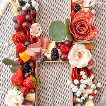 Taylored Charcuterie - the letter h made out of fruit and flowers - Food Delivery Services Near Me Taylored Charcuterie - the letter h made out of fruit and flowers - Food Delivery Services Near Me
