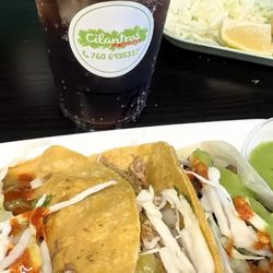 Cilantros La Taqueria - Trio of tacos, carnitas, asada, and cabeza
