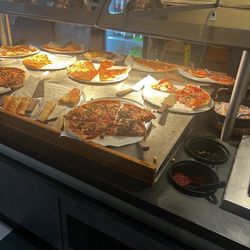 Pizza Inn - Old and old pizza, the tater tots were hard.
