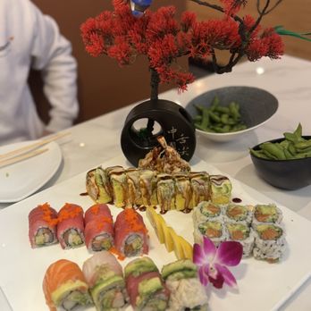 Edo Japanese Steakhouse - Edo's back, Tokyo left, Alaska right, Rainbow front with plenty of ginger present with the flower vase and bird - Japanese Near Me - Gainesville, Florida Edo Japanese Steakhouse - Edo's back, Tokyo left, Alaska right, Rainbow front with plenty of ginger present with the flower vase and bird - Japanese Near Me - Gainesville, Florida
