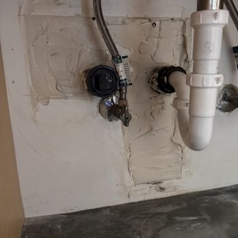 Rooter Hero Plumbing & Air - patched wall after repair of new drain pipe installed - Plumbing Near Me - San Leandro, California