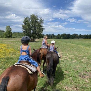 Barron Ranch - Sharron and my daughters. My youngest on a horse named dolly being led by Sharron. - Horseback Riding Near Me - Absarokee, Montana Barron Ranch - Sharron and my daughters. My youngest on a horse named dolly being led by Sharron. - Horseback Riding Near Me - Absarokee, Montana
