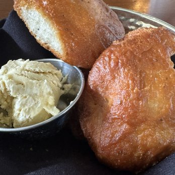 Stoney River - yummy crunchy sesame hot bread rolls, served with a sweet butter. - Steakhouses Near Me - Troy, Michigan Stoney River - yummy crunchy sesame hot bread rolls, served with a sweet butter. - Steakhouses Near Me - Troy, Michigan
