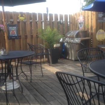 Knute's Tap Room - Weather permitting, you can sit upstairs out on the deck.  A little island music playing sets the mood. - Burgers Near Me - Shippensburg, Pennsylvania