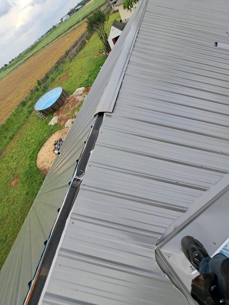 Slide of Mike's roofing and repairs