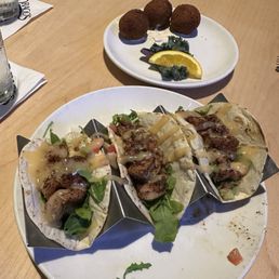 The blackened gator tacos and boudin were perfect!