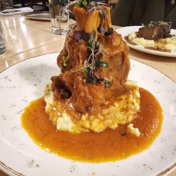 Social Inn - Pork Shank. The meat was sooo tender. Literally fall off the bone. - Cocktail Bars Near Me - Glenview, Illinois