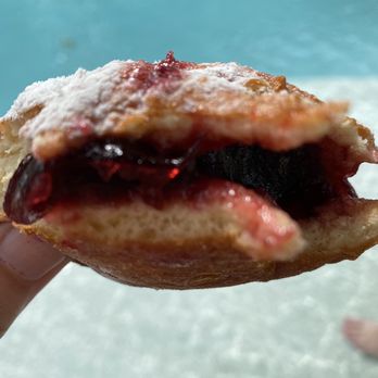 Cremesh Coffee and Bakery - The inside showing all the real raspberry filling - Bakeries Near Me - Bradenton, Florida Cremesh Coffee and Bakery - The inside showing all the real raspberry filling - Bakeries Near Me - Bradenton, Florida