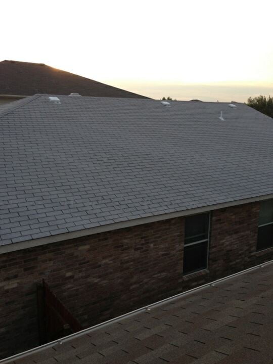 Slide of IAS Roofing & Construction