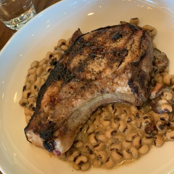 Ember & Iron - SWEET TEA BRINED BONE IN PORK CHOP $27: very good dish. Everything worked well, and it was properly cooked. Must try dish. - American Near Me - Jacksonville, Florida