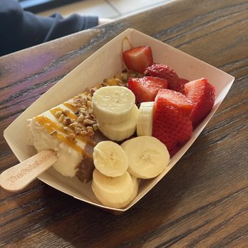 The Paleta Bar - Coconut paleta, dipped in white chocolate, pecans, drizzled with caramel, bananas & strawberries. - Desserts Near Me - Midland, Texas The Paleta Bar - Coconut paleta, dipped in white chocolate, pecans, drizzled with caramel, bananas & strawberries. - Desserts Near Me - Midland, Texas