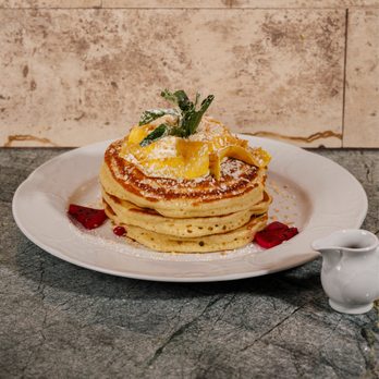 Mariel - Guava Pancakes

Mojito cream cheese whip, coffee maple syrup, guava curd, coconut crumbs - Cuban Near Me - Boston, Massachusetts