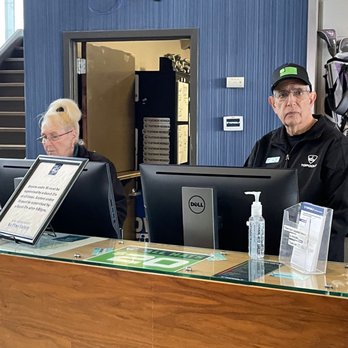Topgolf - These two check in persons. - New American Near Me - Edison, New Jersey Topgolf - These two check in persons. - New American Near Me - Edison, New Jersey
