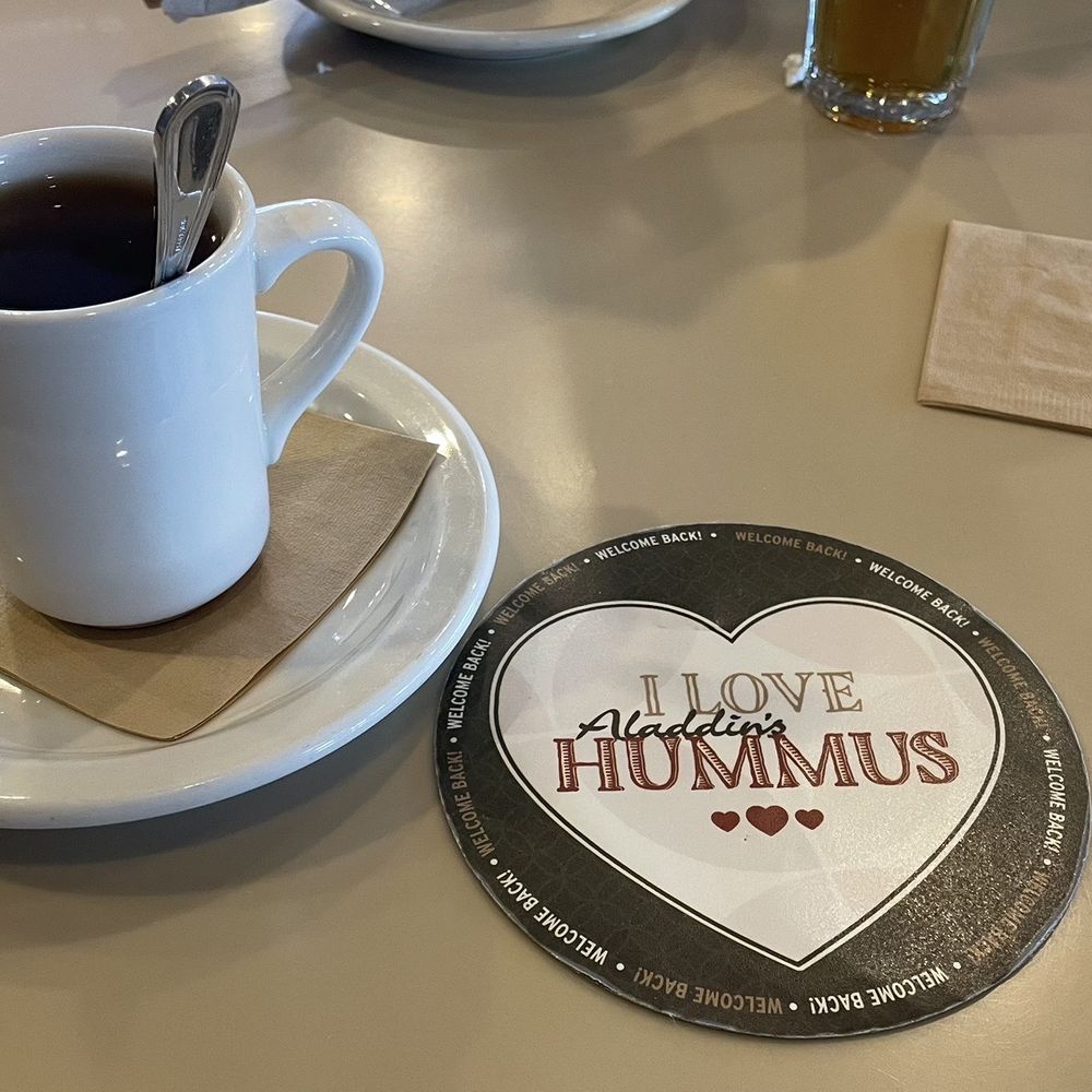 Aladdin's Eatery - Boardman - cup of coffee on a plate - Mediterranean Near Me - Youngstown, Ohio Aladdin's Eatery - Boardman - cup of coffee on a plate - Mediterranean Near Me - Youngstown, Ohio