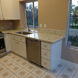 stunning Pacific Cloud quartz countertops and soothing warm off-white semi-custom Shaker cabinetry! stunning Pacific Cloud quartz countertops and soothing warm off-white semi-custom Shaker cabinetry!