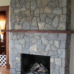 Chimney And Fireplace Repairs & Masonry - This is one that chimneys that we did in Woburn Massachusetts customer wanted two different styles of stone
