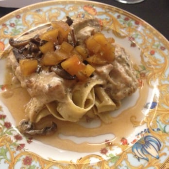Cuisine By Lela - Bone-In Pork Chop with mushroom cream, sweet onion apple relish and buttered pappardelle pasta. - Personal Chefs Near Me