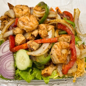 Munchies - Shrimp and Chicken Fajita Salad, served with Homemade Green Sauce and choice of Dressing. - Halal Near Me - Forest Heights, Maryland Munchies - Shrimp and Chicken Fajita Salad, served with Homemade Green Sauce and choice of Dressing. - Halal Near Me - Forest Heights, Maryland