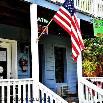Chubby Buddha - an american flag on a porch - Sports Bars Near Me - Shallotte, North Carolina Chubby Buddha - an american flag on a porch - Sports Bars Near Me - Shallotte, North Carolina