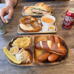 Sausage platter, turkey and pesto sandwich, small pretzel and hummus Sausage platter, turkey and pesto sandwich, small pretzel and hummus