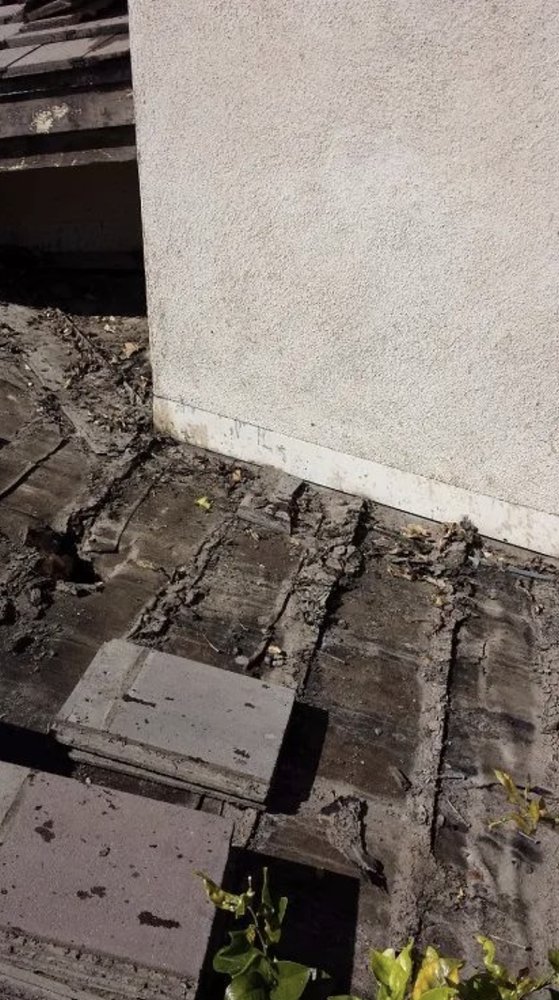 Slide of Romero's Roofing