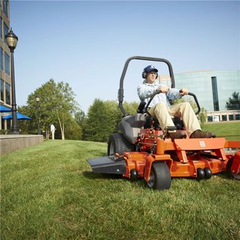 Triston's Yard Care - a man riding a lawn mower - Lawn Services Near Me - Columbus Junction, Iowa Triston's Yard Care - a man riding a lawn mower - Lawn Services Near Me - Columbus Junction, Iowa