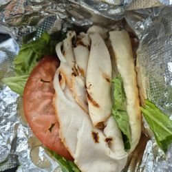 Charcoal Grill - Kids pit turkey sandwich with lettuce, tomato,  onions, and a little horseradish