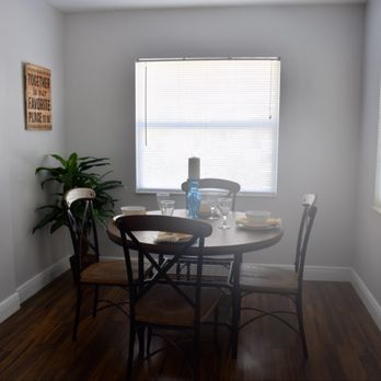 Simple Craft - Dining area with laminate flooring installed. Painted walls with molding and frames. - Cabinetry Near Me Simple Craft - Dining area with laminate flooring installed. Painted walls with molding and frames. - Cabinetry Near Me