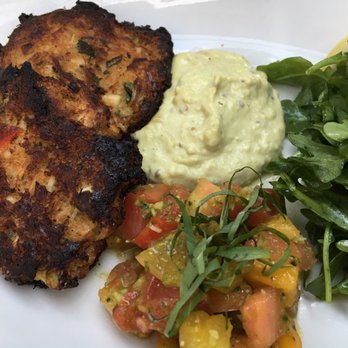 Pie + Vine - Crabcakes with a delicious roumelade, tomato mixture, and arugula with a vinaigrette. - Italian Near Me - Ashland, Oregon Pie + Vine - Crabcakes with a delicious roumelade, tomato mixture, and arugula with a vinaigrette. - Italian Near Me - Ashland, Oregon