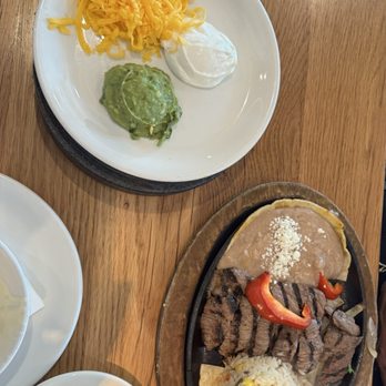Gloria's Latin Cuisine - Grilled Steak Fajita with setup - Tex-Mex Near Me - Prosper, Texas Gloria's Latin Cuisine - Grilled Steak Fajita with setup - Tex-Mex Near Me - Prosper, Texas