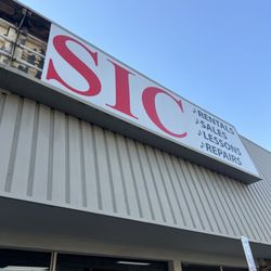 Singer Music - Recent winds knocked out half of the sign