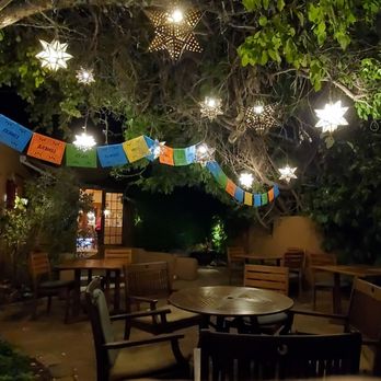 Inn On the Alameda - Dinner at the Inn, under the lights. - Hotels Near Me - Santa Fe, New Mexico
