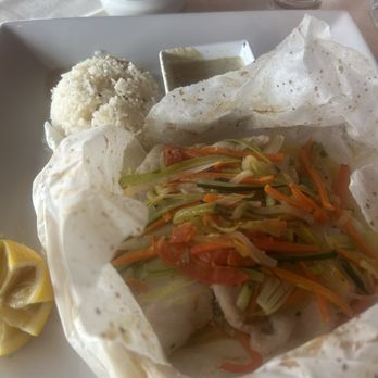 La Petite Maison - Flounder special in parchment! Amazing sauce on side and I wish I knew what kind it was! - French Near Me - Atlanta, Georgia