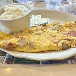 Three Brothers Diner - Meat Lovers Omelette With Grits