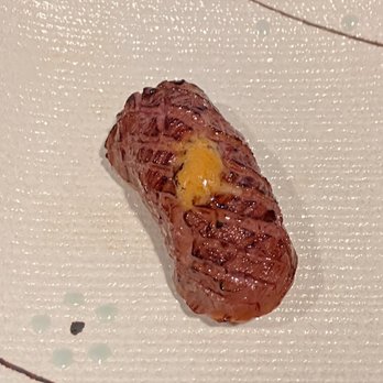 Yoshitomo - Wagyu with uni butter - Sushi Bars Near Me - Omaha, Nebraska Yoshitomo - Wagyu with uni butter - Sushi Bars Near Me - Omaha, Nebraska