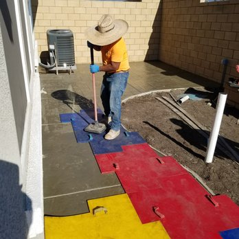 CJL Construction - backyard being stamped with design by CJL Construction worker - General Contractors Near Me - Riverside, California CJL Construction - backyard being stamped with design by CJL Construction worker - General Contractors Near Me - Riverside, California