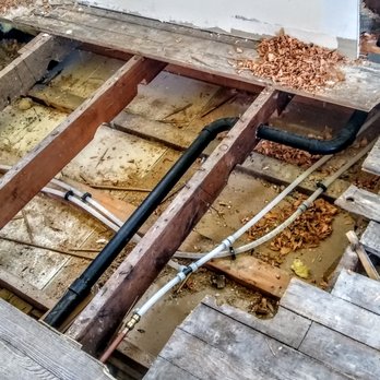 Coastal Plumbing - This is just part of the mess that the plumber left behind in the hole in the floor, along with a ton of debris outside of it. - Plumbing Near Me - Warrenton, Oregon Coastal Plumbing - This is just part of the mess that the plumber left behind in the hole in the floor, along with a ton of debris outside of it. - Plumbing Near Me - Warrenton, Oregon