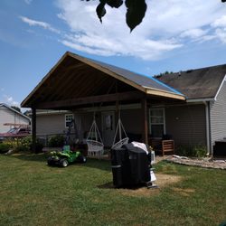 Eric Peterman Roofing - Finished with framing in the porch roof. Its dried in now and will be shingled soon