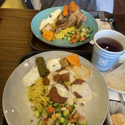 Falafel Platter (front) and lamb shank special (back) with a hot tea and baklava