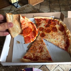 Tonys Pizza - What's in this photo? A NON WELL DONE PIZZA.