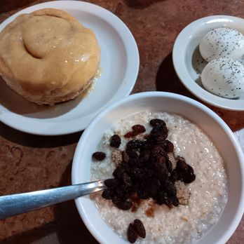 Omelets etc - The oatmeal side ($4.99).  Cinnamon roll ($6.99). 2 eggs ($2.99). - Breakfast & Brunch Near Me - Colorado Springs, Colorado