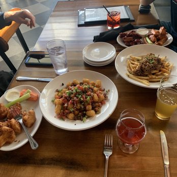 State 48 Lager House - Totchos Cauliflower Wings Chicken Wings Disco Fries mango lager blackberry sour cranberry and vodka well - Brewpubs Near Me - Scottsdale, Arizona