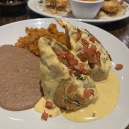 Fajita chimichanga with rice and beans