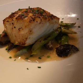The Capital Grille - Pan-Seared Sea Bass with Shiitake Mushrooms, Asparagus and Miso Butter - Steakhouses Near Me - Paramus, New Jersey The Capital Grille - Pan-Seared Sea Bass with Shiitake Mushrooms, Asparagus and Miso Butter - Steakhouses Near Me - Paramus, New Jersey