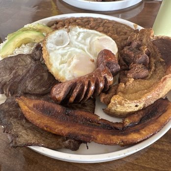 Casera Latin Kitchen and Bakery - Bandeja Paisa and Pollo Saltado ( in the background) - Peruvian Near Me - Oceanside, California