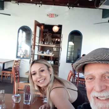Olympic Cafe - The patio was a great place to sit with overhead heaters, ceiling fans, distance from the street & rolldown clear panels if it gets windy! - Mediterranean Near Me - San Diego, California Olympic Cafe - The patio was a great place to sit with overhead heaters, ceiling fans, distance from the street & rolldown clear panels if it gets windy! - Mediterranean Near Me - San Diego, California