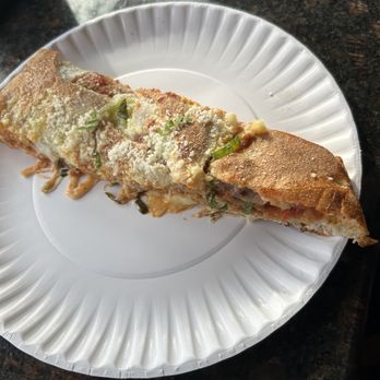 Nonna's Pizzeria - Stuffed eggplant slice piece (part of a slice). Too full to eat another slice - Pizza Near Me - Staten Island, New York