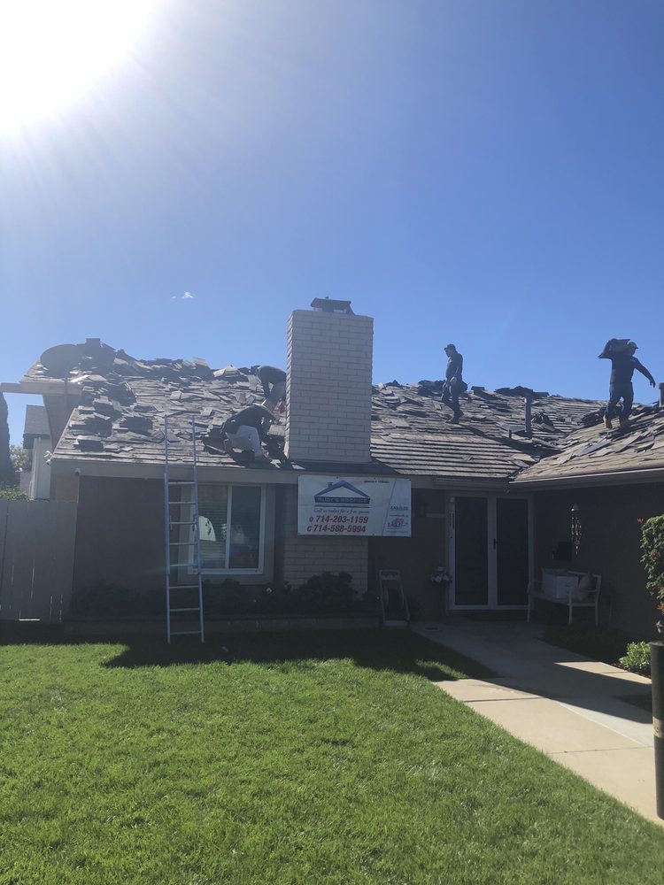 Slide of Rudy’s roofing